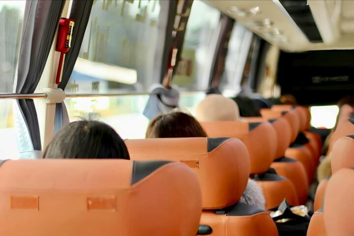 Employees boarding a staff transportation coach